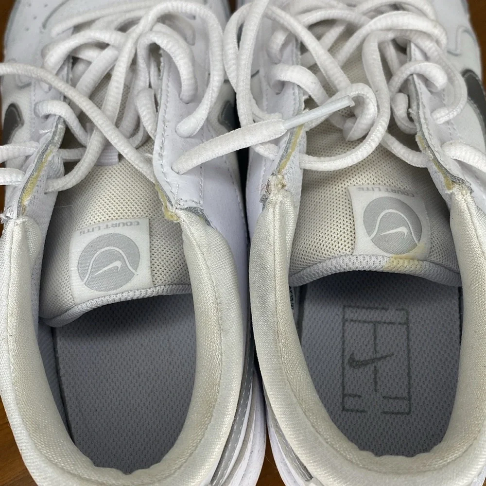 Nike White Sneakers with Silver Swoosh
